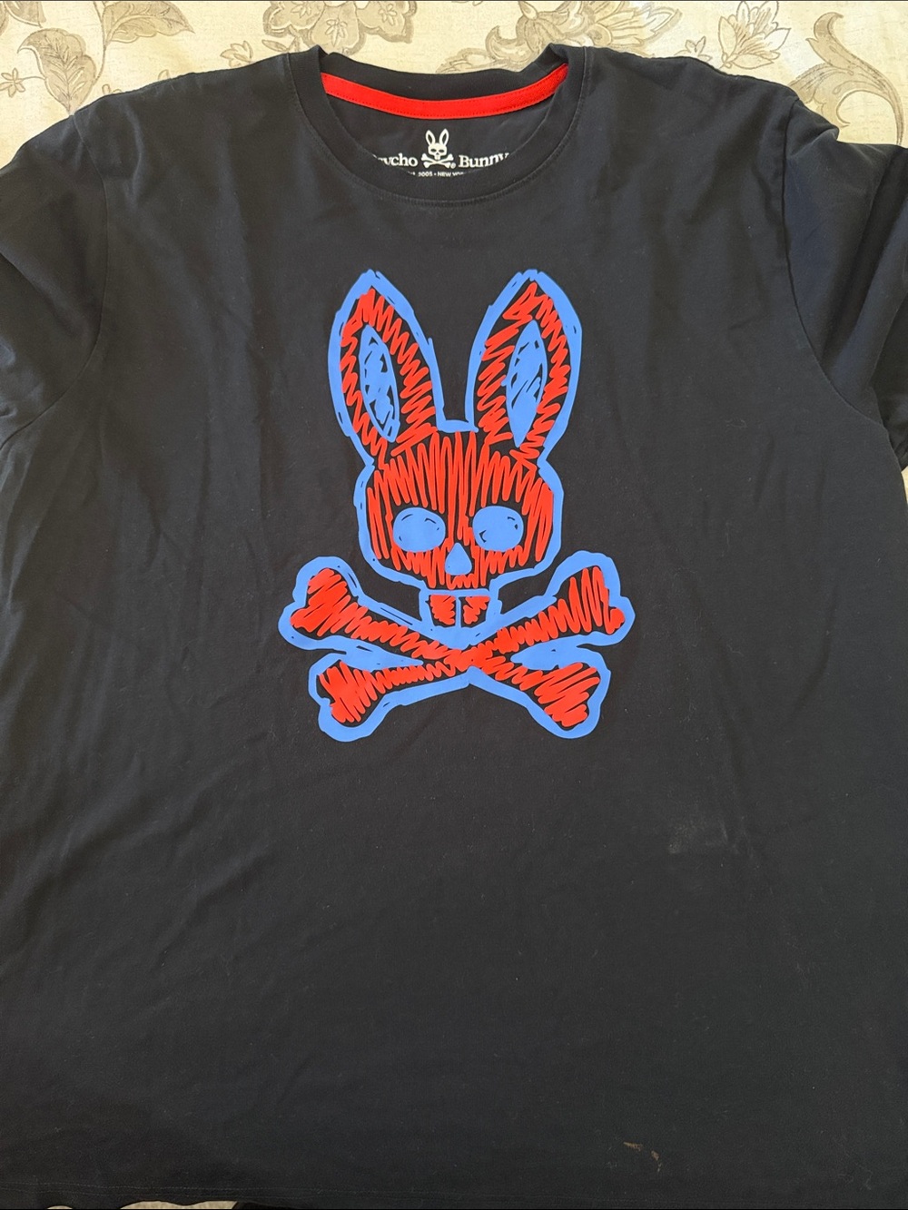 Psycho Bunny Black Short Sleeve Tee with Red & Blue Skull Bunny Graphic
